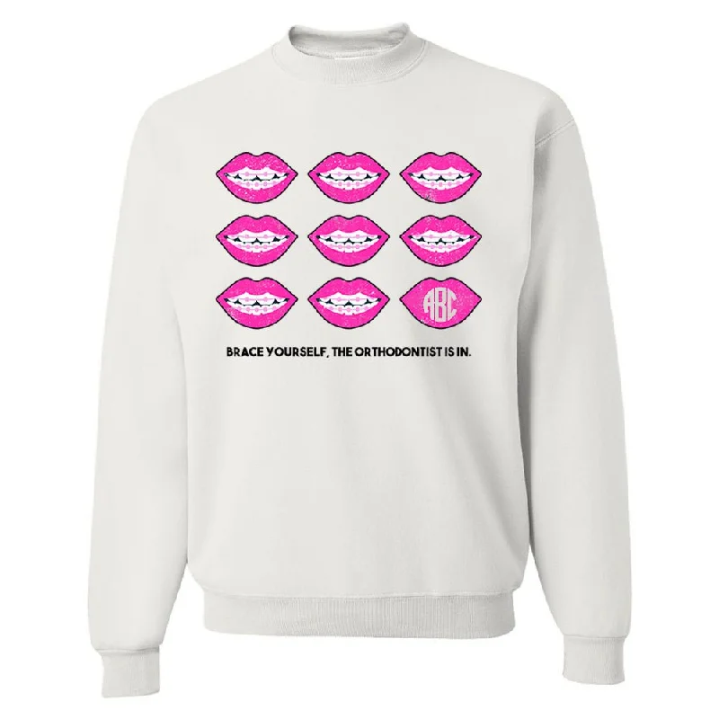 More Discounts, More Joy!Monogrammed 'Brace Yourself, The Orthodontist Is In' Crewneck Sweatshirt More Discounts, More Joy!Monogrammed 'Brace Yourself, The Orthodontist Is In' Crewneck Sweatshirt