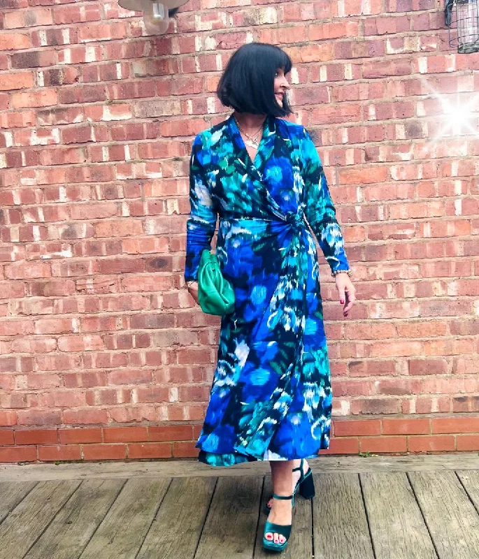 The Sale You’ve Been Waiting For!Vibrant Blue Wrap Midi Dress