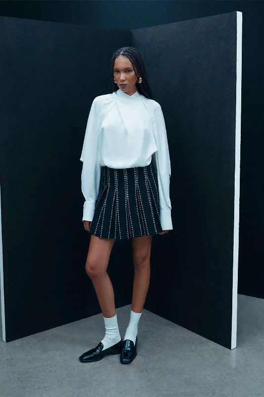 Get More, Spend Less – Shop Now!Pleated Mini Bell Skort