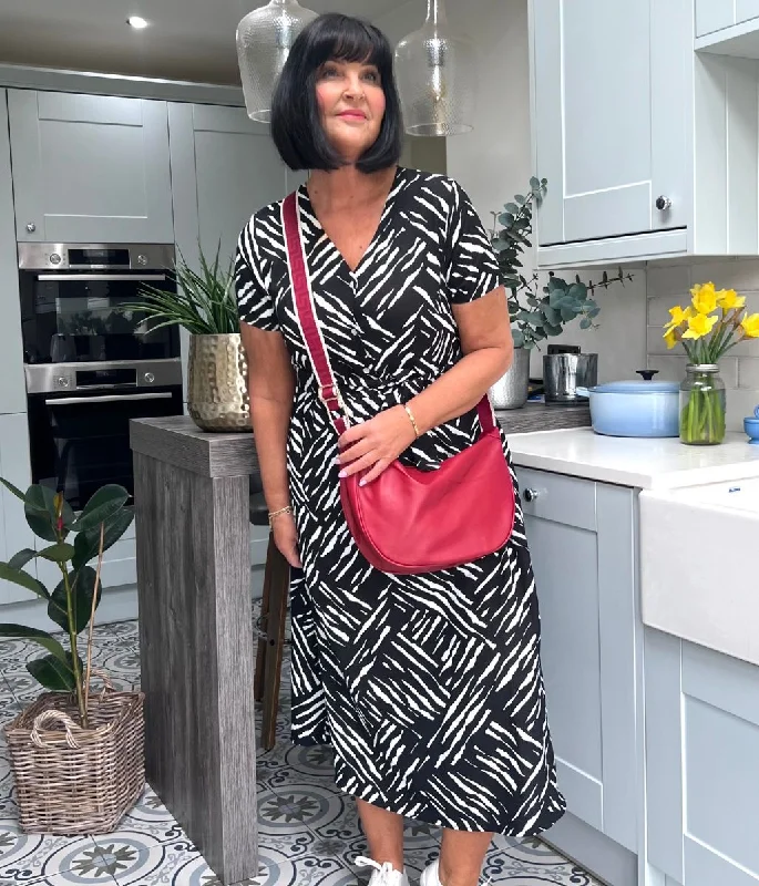 Exclusive Offers You’ll Love!Zebra Print Belted Midi Dress